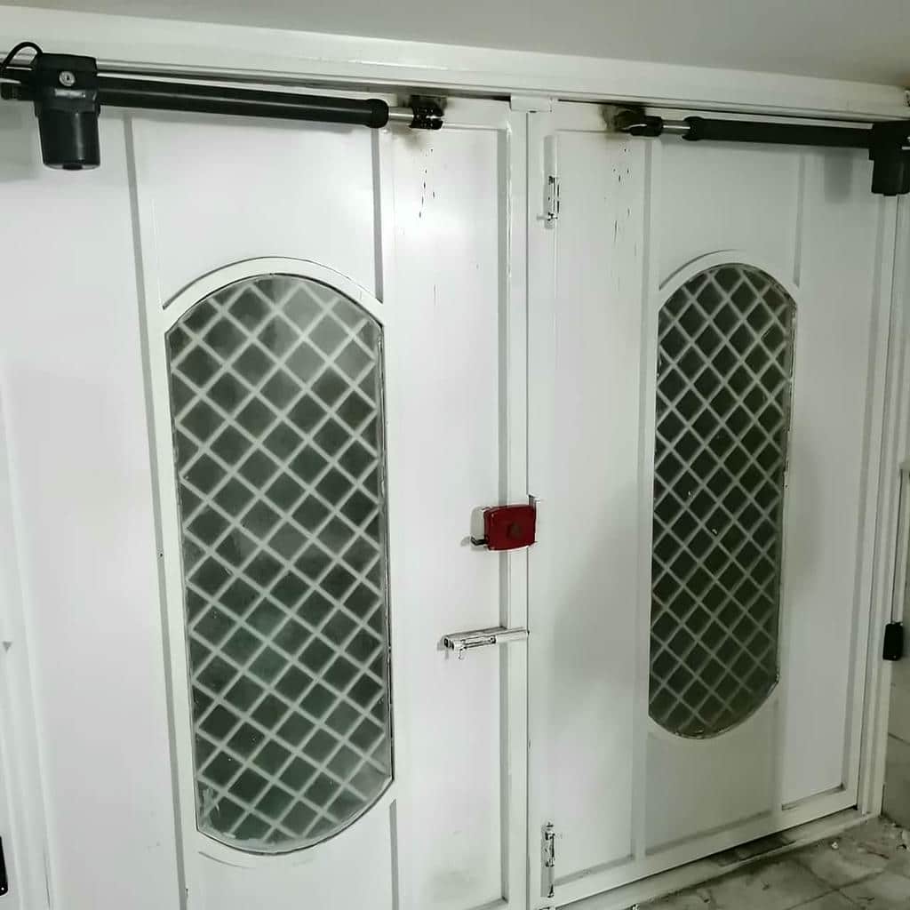 نصب جک درب پارکینگ تراز دقیق در مهرشهر کرج