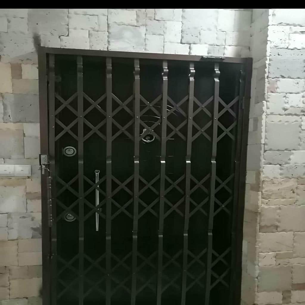 فروش درب حفاظ آکاردئونی ریل استاندارد در بیرجند