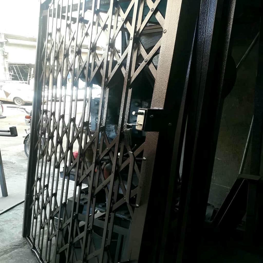 فروش درب حفاظ آکاردئونی ریل استاندارد در ایرانشهر