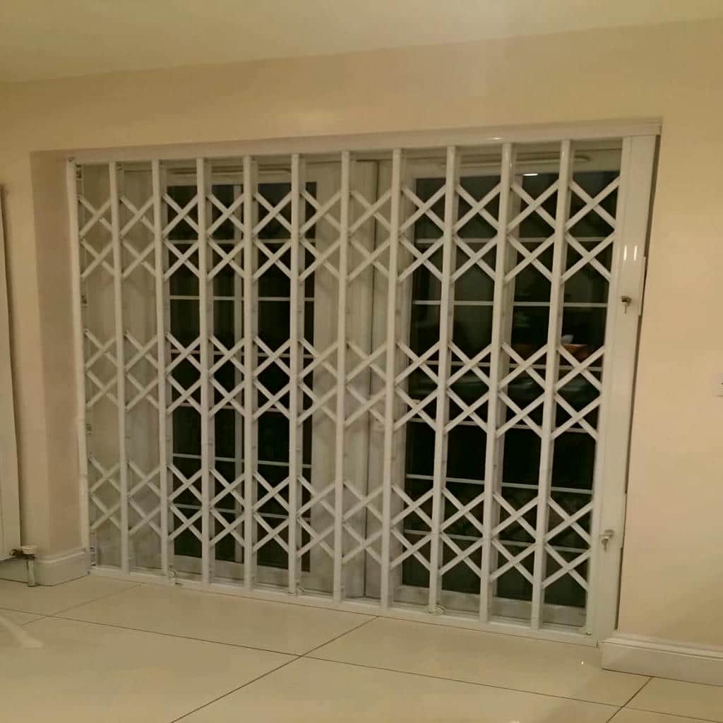 نصب درب حفاظ آکاردئونی تمام گل در کرمانشاه