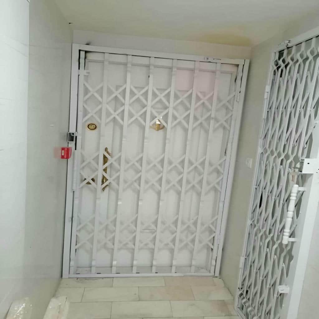 خرید درب حفاظ آکاردئونی دوگل در کمال شهر
