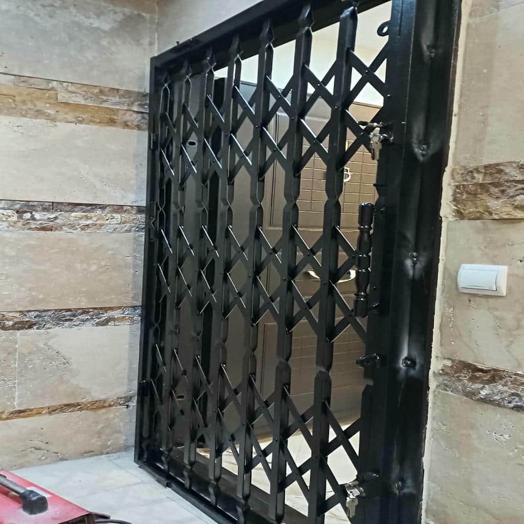 خرید درب حفاظ آکاردئونی تسمه تقویتی در ایرانشهر