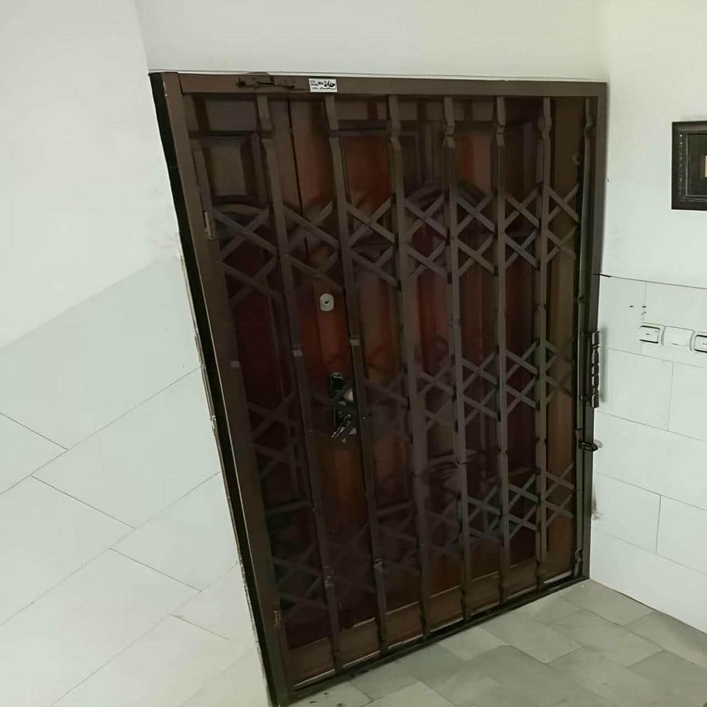 نصب درب حفاظ آکاردئونی تمام گل در تهران