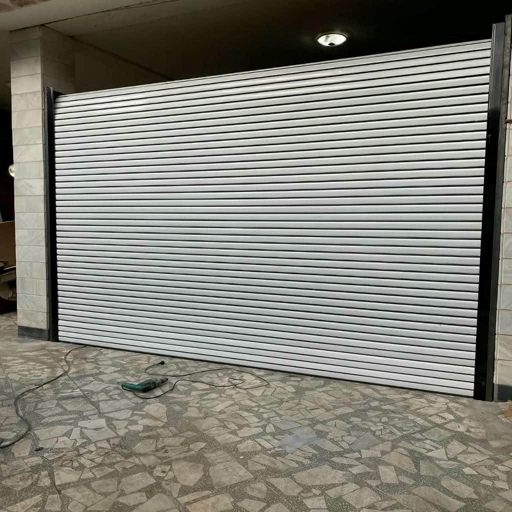 سفارش کرکره برقی صنعتی فولادی با موتور ساید