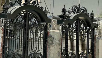 درب حیاط پانل دار با قاب آهنی مقاوم و رنگ مشکی مات