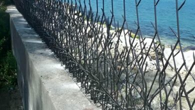 حفاظ روی دیوار حیاط فلزی مقاوم