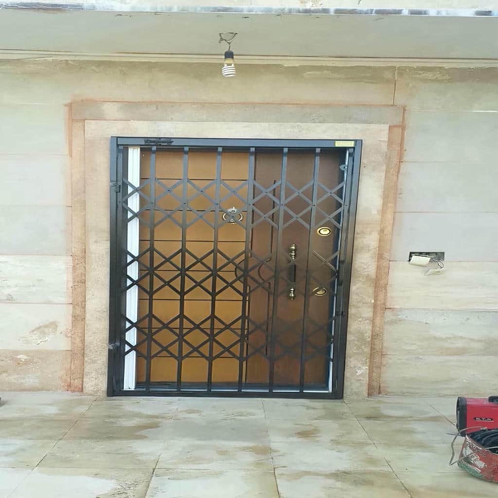 حفاظ درب آکاردئونی با قفل مرکزی در استان خراسان رضوی