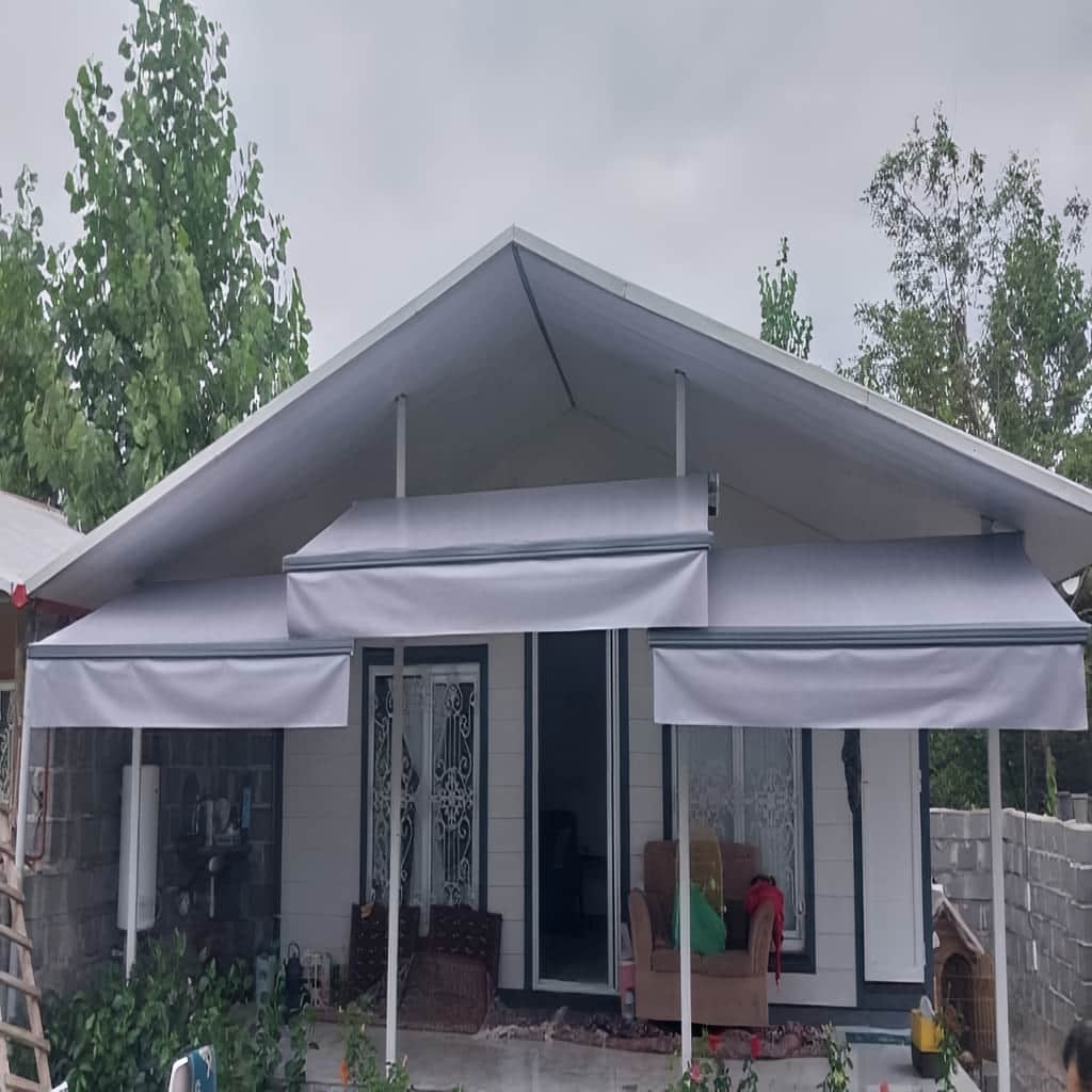 سایبان برقی بازویی سفید برای ورودی ساختمان